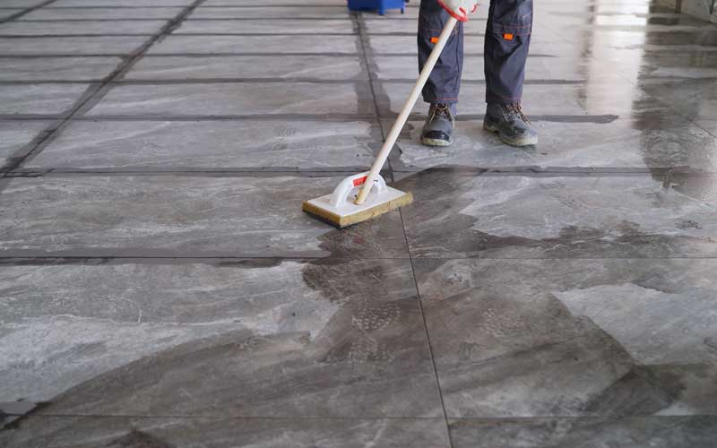 Person cleaning the floor