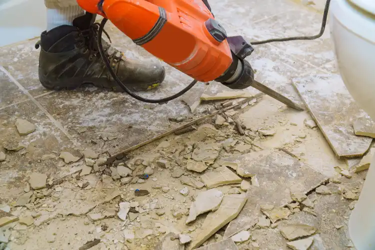 Demolishing a floor with a power chisel
